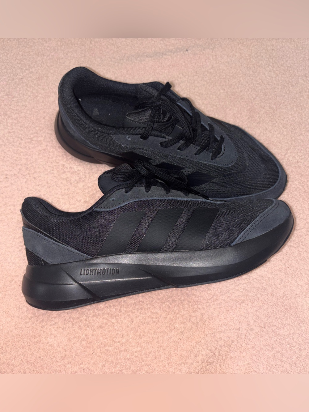 adidas Black Athletic Sneakers with Subtle White Tag Detail